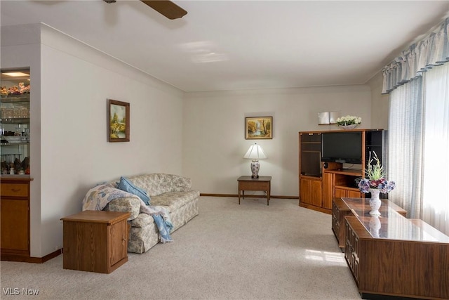7080 Arcadia Dr, Parma, OH 44129 - living room featuring light carpet and ceiling fan