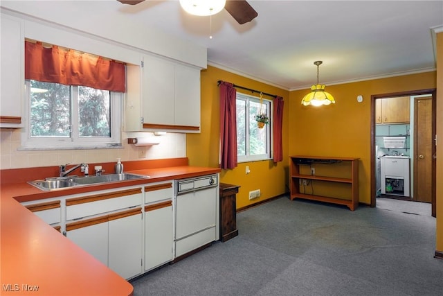 7080 Arcadia Dr, Parma, OH 44129 - kitchen with white dishwasher, white cabinetry, a ceiling fan, decorative light fixtures, and dark carpet