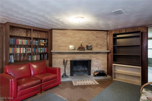 7080 Arcadia Dr, Parma, OH 44129 - carpeted living area featuring a fireplace and built in features