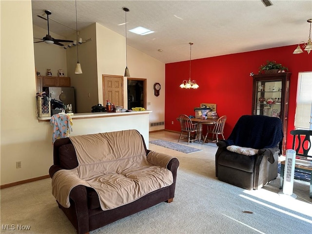 16199 Emerald Pt, Middleburg Heights, OH 44130 - living area with lofted ceiling, light carpet, a chandelier, and ceiling fan