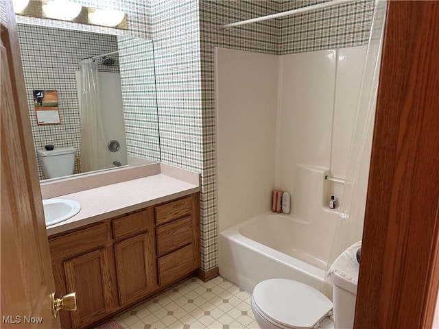 16199 Emerald Pt, Middleburg Heights, OH 44130 - bathroom featuring shower / bath combination with curtain, vanity, and tile patterned floors