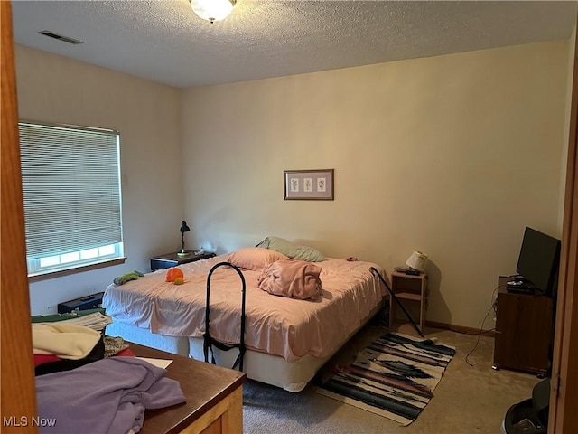 16199 Emerald Pt, Middleburg Heights, OH 44130 - carpeted bedroom featuring a textured ceiling