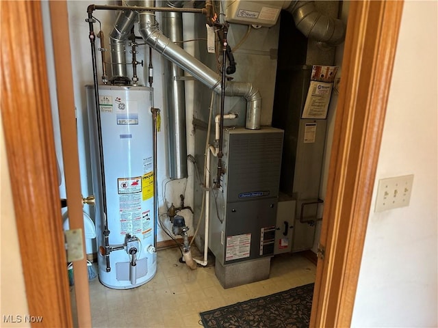 16199 Emerald Pt, Middleburg Heights, OH 44130 - utility room featuring water heater