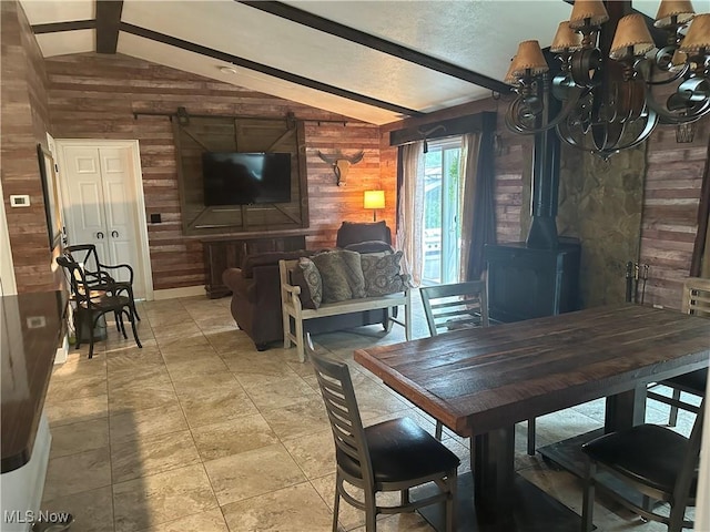1995 Fox Chase, Youngstown, OH 44515 - dining area featuring wood walls, a wood stove, and a chandelier