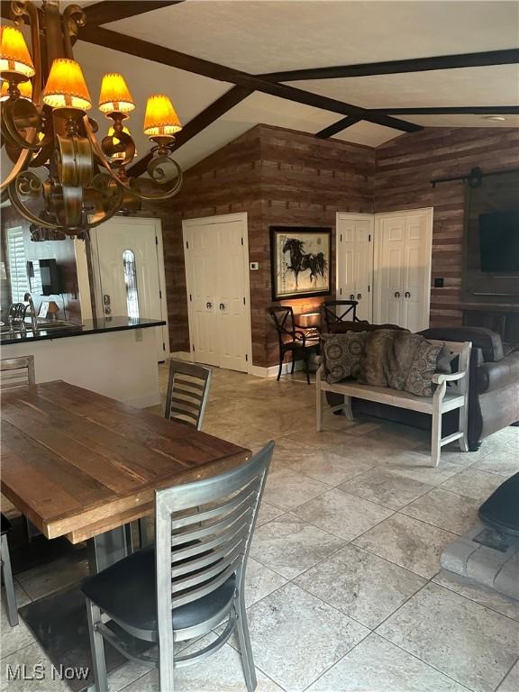 1995 Fox Chase, Youngstown, OH 44515 - dining room with wood walls and a chandelier