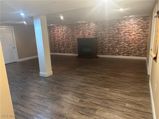 1995 Fox Chase, Youngstown, OH 44515 - finished below grade area featuring a fireplace, dark wood finished floors, and brick wall