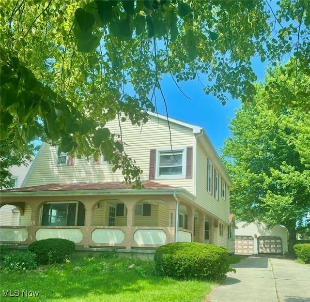 1709 E 29th St, Lorain, OH 44055 - view of front of house with a garage