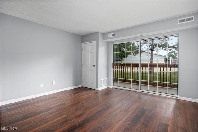 27087 Oakwood Cir Unit 102Y, Olmsted Twp, OH 44138 - spare room featuring wood finished floors and baseboards