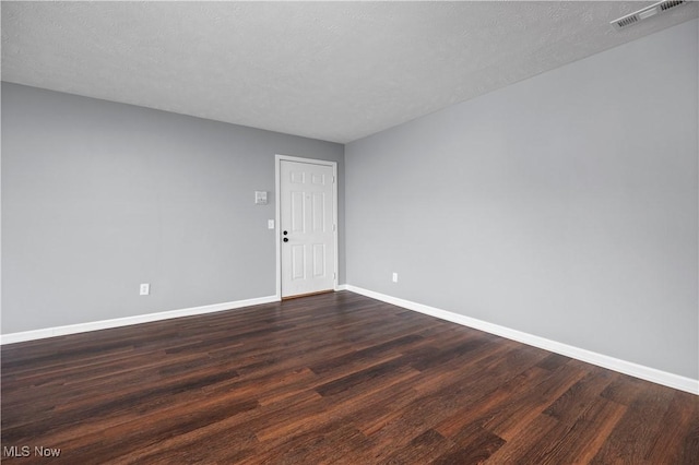 27087 Oakwood Cir Unit 102Y, Olmsted Twp, OH 44138 - spare room featuring dark wood-style floors