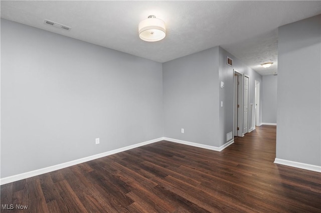 27087 Oakwood Cir Unit 102Y, Olmsted Twp, OH 44138 - unfurnished room with dark wood-style flooring
