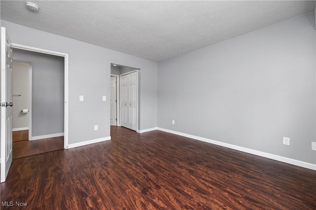 27087 Oakwood Cir Unit 102Y, Olmsted Twp, OH 44138 - unfurnished bedroom with wood finished floors and a closet