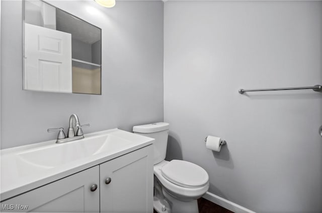 27087 Oakwood Cir Unit 102Y, Olmsted Twp, OH 44138 - bathroom with vanity and wood finished floors