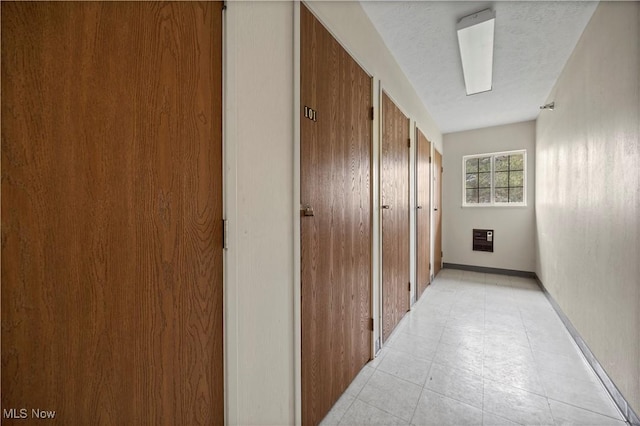 27087 Oakwood Cir Unit 102Y, Olmsted Twp, OH 44138 - hallway with light tile patterned floors