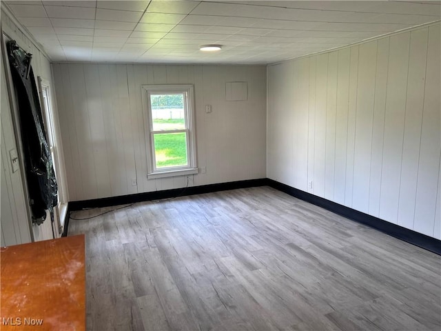 713 N 7th St, Bergholz, OH 43908 - unfurnished room with wood finished floors and baseboards
