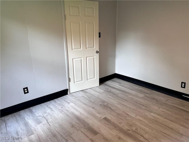 713 N 7th St, Bergholz, OH 43908 - unfurnished room featuring wood finished floors and baseboards