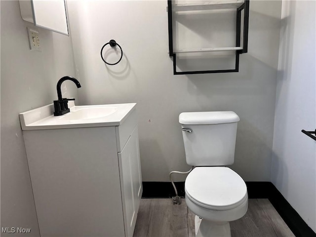 713 N 7th St, Bergholz, OH 43908 - half bath with vanity and wood finished floors