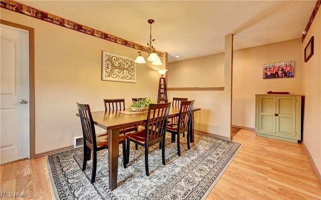 99 Mccook Ave, Carrollton, OH 44615 - dining room with light wood-style flooring and baseboards