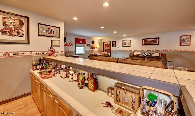 99 Mccook Ave, Carrollton, OH 44615 - bar featuring recessed lighting and light wood-type flooring