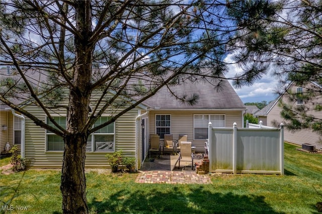 1446 Chesapeake Ave, Louisville, OH 44641 - rear view of property featuring a patio