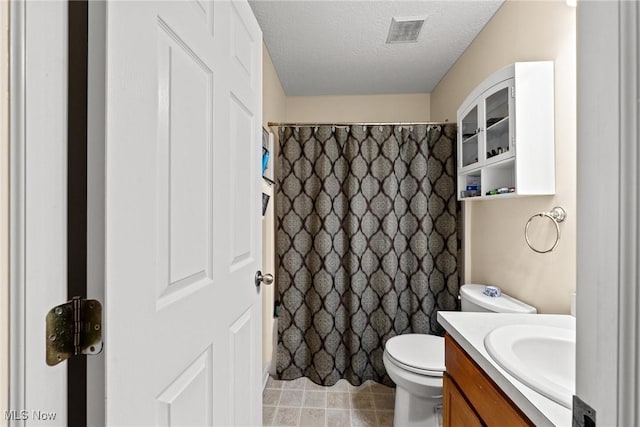 1446 Chesapeake Ave, Louisville, OH 44641 - bathroom with vanity, a textured ceiling, a shower with curtain, and tile patterned flooring