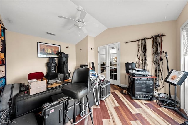 1446 Chesapeake Ave, Louisville, OH 44641 - office with french doors, wood finished floors, ceiling fan, and vaulted ceiling