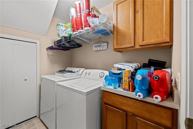1446 Chesapeake Ave, Louisville, OH 44641 - laundry room featuring washer and dryer and a textured ceiling