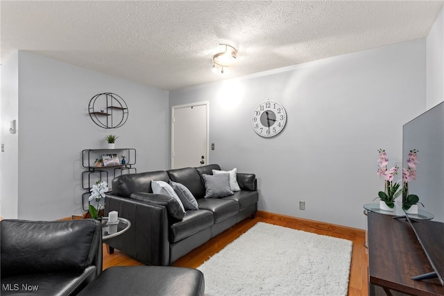 22936 Mastick Rd, Fairview Park, OH 44126 - living area with wood finished floors and a textured ceiling