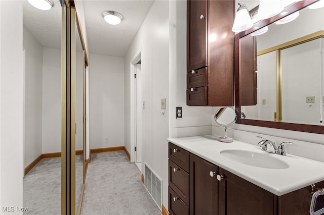 22936 Mastick Rd, Fairview Park, OH 44126 - bathroom with vanity and a textured ceiling