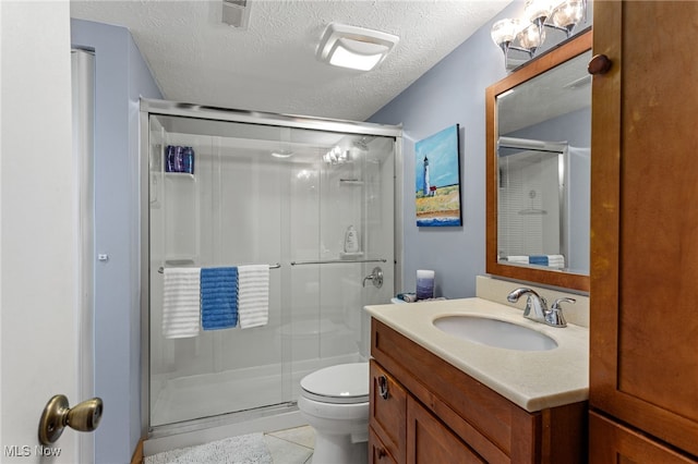 22936 Mastick Rd, Fairview Park, OH 44126 - full bath featuring a stall shower, vanity, tile patterned flooring, and a textured ceiling