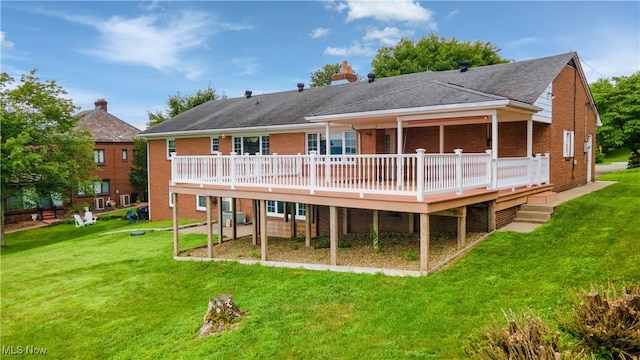 3945 Palisades Dr, Weirton, WV 26062 - back of property featuring brick siding, a lawn, a wooden deck, and a chimney