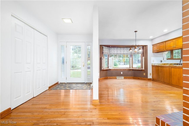 3945 Palisades Dr, Weirton, WV 26062 - foyer with light wood-type flooring, plenty of natural light, a chandelier, and recessed lighting