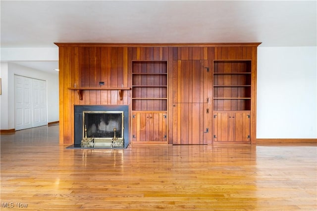3945 Palisades Dr, Weirton, WV 26062 - unfurnished living room with wood finished floors and a large fireplace