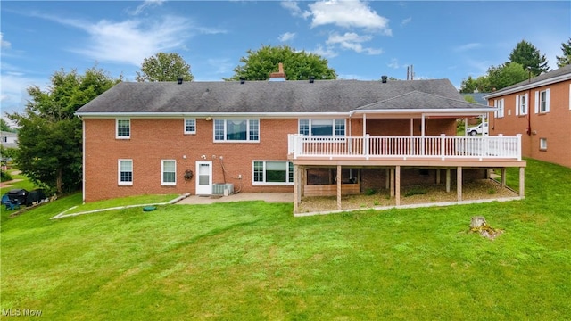 3945 Palisades Dr, Weirton, WV 26062 - rear view of property with a lawn, a wooden deck, a patio area, and brick siding