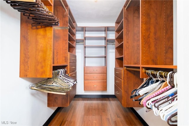 3945 Palisades Dr, Weirton, WV 26062 - walk in closet with dark wood-type flooring