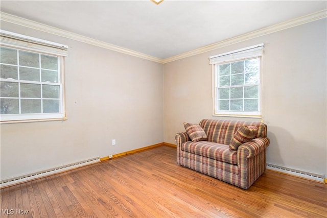 3945 Palisades Dr, Weirton, WV 26062 - sitting room with a baseboard heating unit, baseboard heating, wood finished floors, and crown molding
