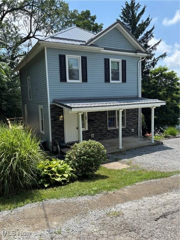 600 Marcus St, East Liverpool, OH 43920 - view of front of property with a metal roof and stone siding