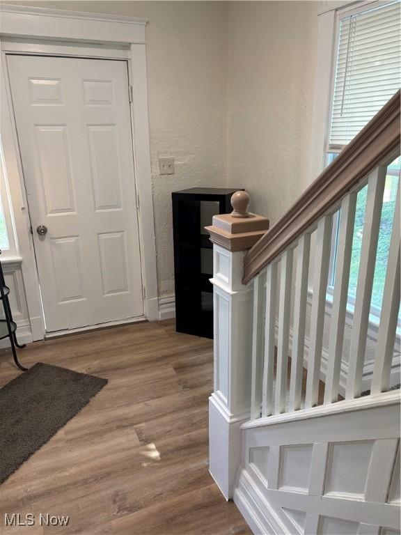 600 Marcus St, East Liverpool, OH 43920 - foyer with wood finished floors, plenty of natural light, and a textured wall