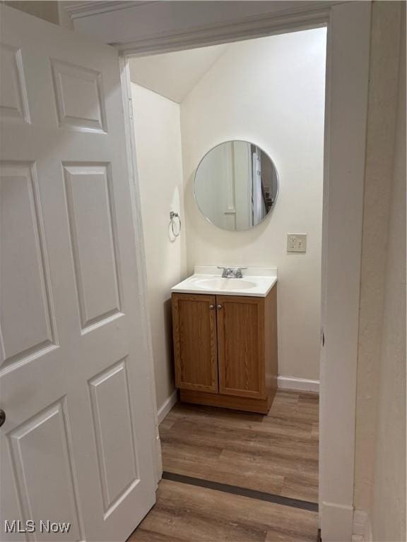 600 Marcus St, East Liverpool, OH 43920 - bathroom with vanity and wood finished floors