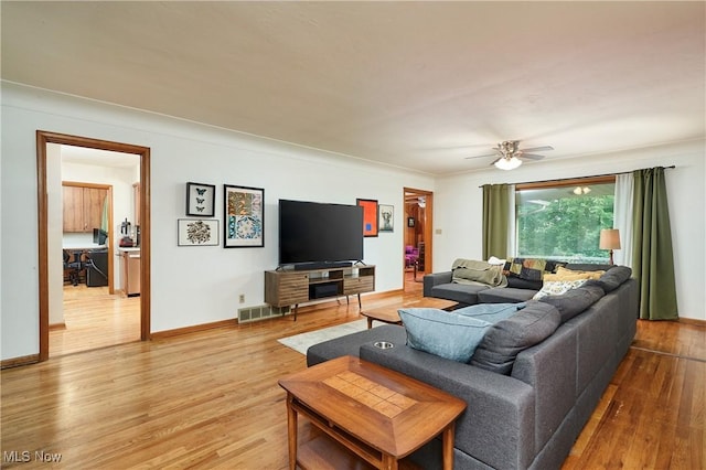 5552 Briarcliff Dr, Garfield Heights, OH 44125 - living room with wood finished floors and ceiling fan