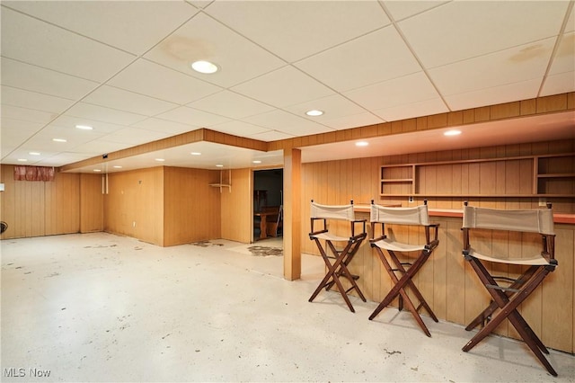 5552 Briarcliff Dr, Garfield Heights, OH 44125 - finished below grade area with a dry bar, a paneled ceiling, wooden walls, and recessed lighting