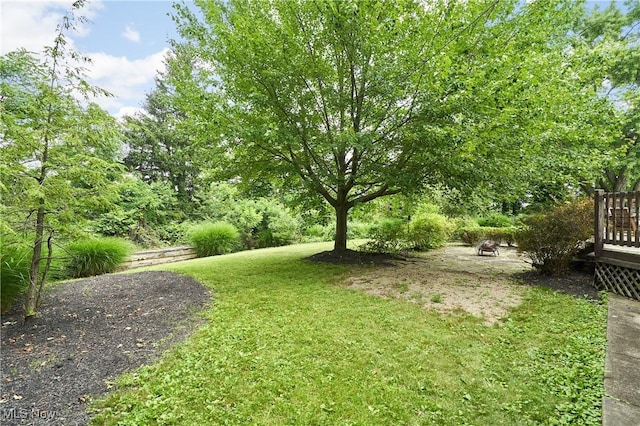 5552 Briarcliff Dr, Garfield Heights, OH 44125 - view of grassy yard featuring a wooden deck