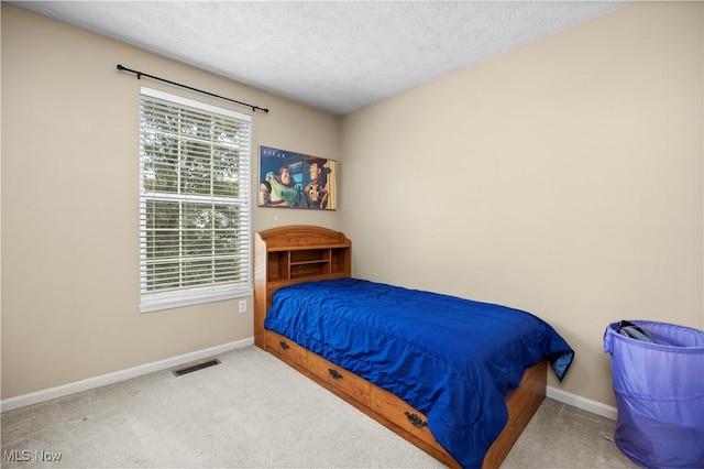 9034 Huxley Ln, Olmsted Twp, OH 44138 - bedroom with a textured ceiling and carpet