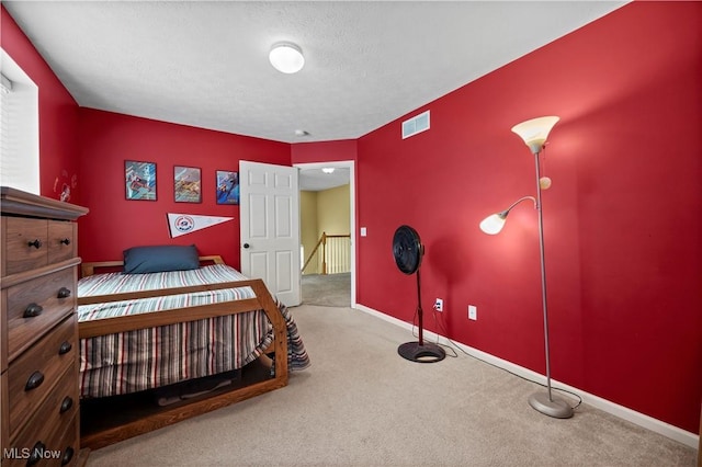 9034 Huxley Ln, Olmsted Twp, OH 44138 - carpeted bedroom featuring baseboards and a textured ceiling