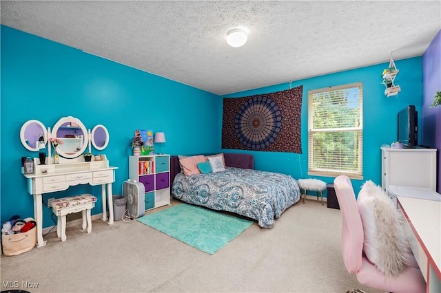 9034 Huxley Ln, Olmsted Twp, OH 44138 - bedroom featuring carpet floors and a textured ceiling