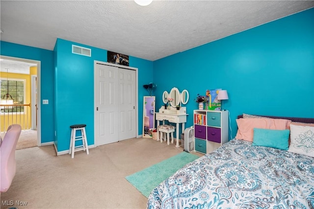 9034 Huxley Ln, Olmsted Twp, OH 44138 - carpeted bedroom with a closet and a textured ceiling