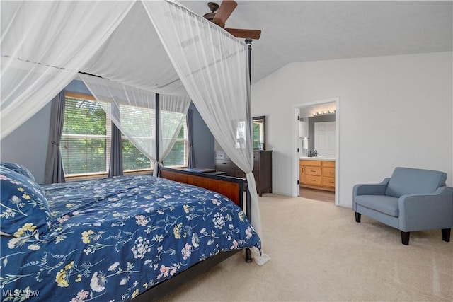 9034 Huxley Ln, Olmsted Twp, OH 44138 - bedroom featuring lofted ceiling, carpet flooring, multiple windows, connected bathroom, and ceiling fan