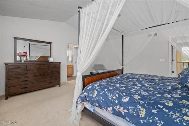 9034 Huxley Ln, Olmsted Twp, OH 44138 - bedroom featuring lofted ceiling, carpet floors, and connected bathroom