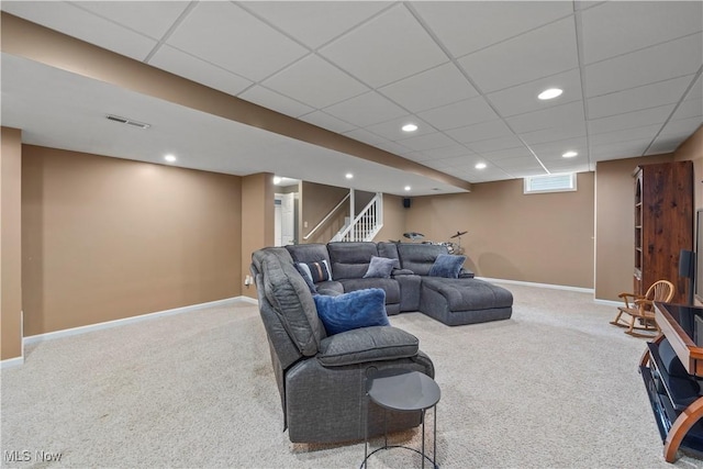 9034 Huxley Ln, Olmsted Twp, OH 44138 - carpeted living room featuring stairway, recessed lighting, and a paneled ceiling