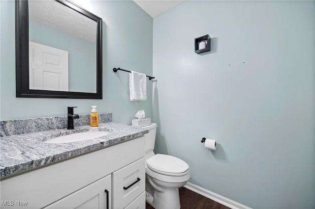 9034 Huxley Ln, Olmsted Twp, OH 44138 - half bath with vanity and wood finished floors