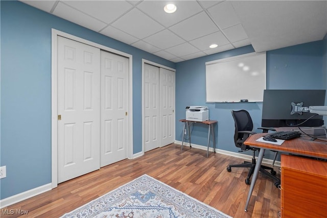 9034 Huxley Ln, Olmsted Twp, OH 44138 - home office featuring wood finished floors and a paneled ceiling